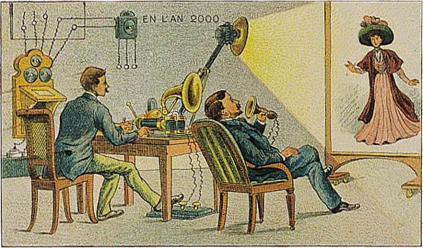 A 1910 French card showing a couple watching a distant person on a screen during a call